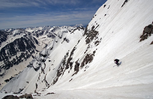 Christy Mahon skiing off the summit of South Maroon Peak.