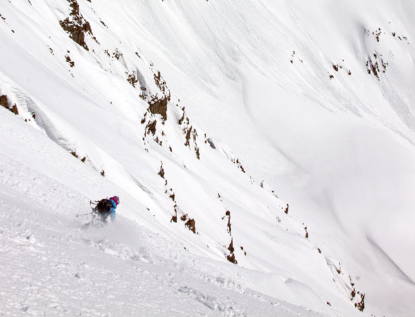 Anda SMalls skiing the East Face of Castle Peak.