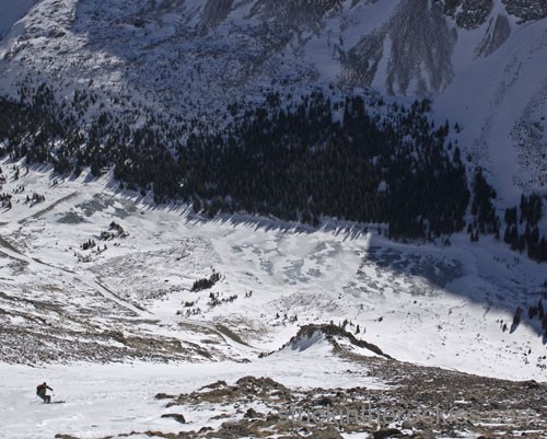 Lower down the couloir, the snow went right to the road and to the trucks.