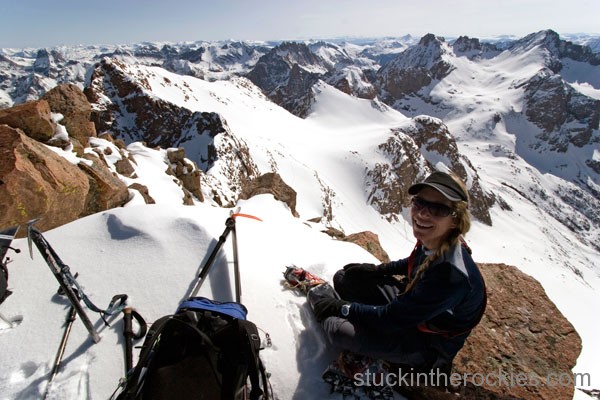 Christy on the summit. North Eolus, Glacier Point, Sunlight, and Windom are in view, from left to right.