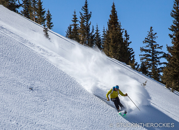 Chris Davenport skis powder on Highlands Ridge