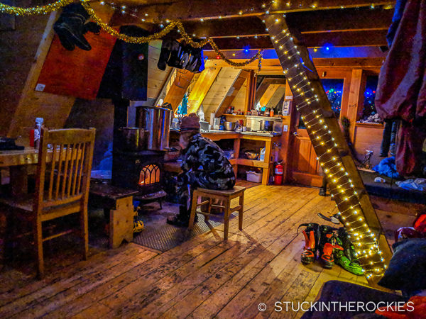 Christy Mahon by the wood stove at Tagert Hut