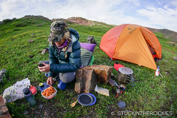 Christy Mahon making dinner at camp