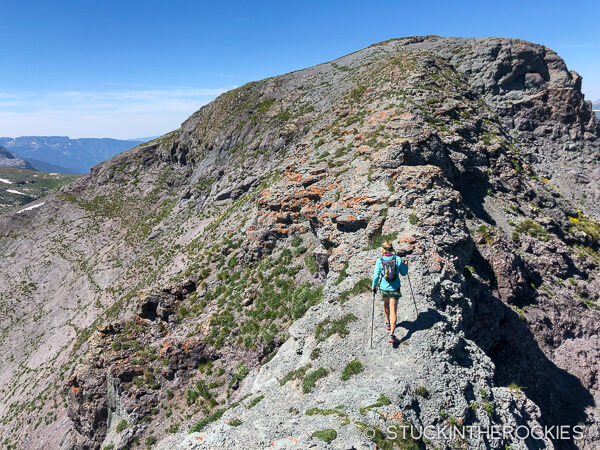 Christy Mahon on a typical San Juan 13er summit.