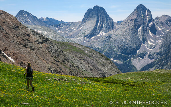 Christy Mahon runs in front of Vestal and Arrow peaks