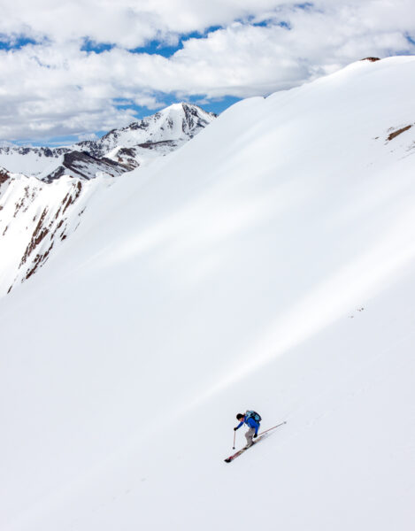 Anda Smalls skis the East Face of Independence Mountain, on the south side of Highway 82, above the ghost town.