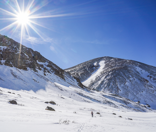 Skinning up to ski Mount Sheridan