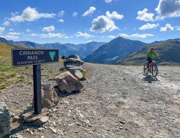 A rider reaches Cinnamon Pass.