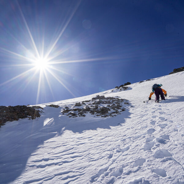 Christy Mahon is kicking steps up Mount Emma for a spring ski descent.